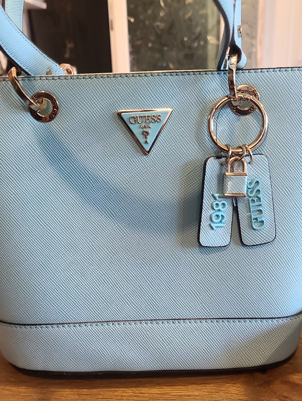 GUESS Light Blue Saffiano Tote with Gold Hardware and Logo Charms
